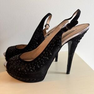 Guess stiletto pumps/heels black with rhinestones. Worn only couple times.